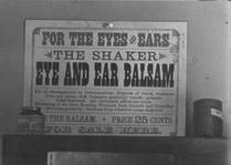 SA0741.38 - Photo of advertisement for eye and ear balsam in Sisters' Shop., Winterthur Shaker Photograph and Post Card Collection 1851 to 1921c